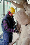 man using chipping hammer